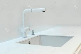 They come in a variety of kitchen sinks are a key element of great kitchen design from a practical and design standpoint. A New White Kitchen Sink Made Of Artificial Stone And A Faucet Stock Photo Picture And Royalty Free Image Image 97605401