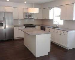 Check spelling or type a new query. L Shaped Kitchen Layout White Shaker Kitchen Kitchen Cabinet Design Kitchen Layout