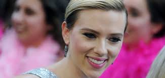 Scarlett Johansson shines in silver at 'Rough Night' premiere