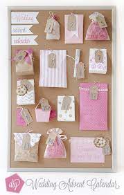 Form the shape of a christmas tree with envelopes in various sizes, and mark each with adhesive numbers. How To Make A Wedding Advent Calendar Wedding Countdown Diy Wedding Best Bridesmaid Gifts