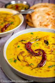 Red lentil dahl (dal) recipe which is a flavorful and delicious dinner. Dal Recipe Indian Lentil Curry The Delicious Crescent