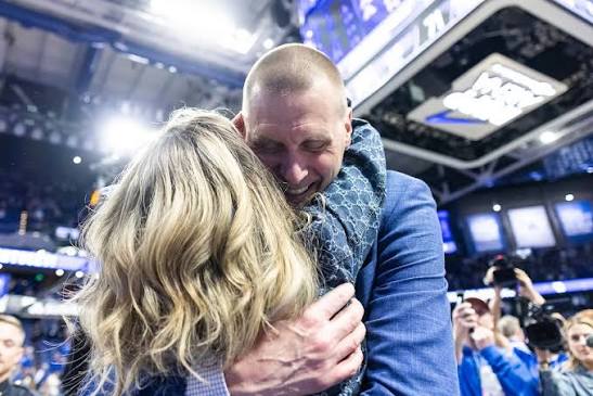 Mark Pope celebrates with his wife and daughters after Kentucky's comeback  win over Tennessee.💙 📸: UK Athletics | #BBN