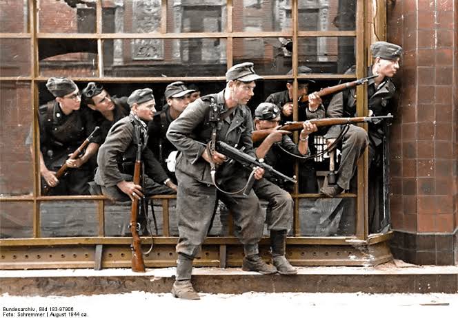 Colorized photo of the infamous Dirlewanger Brigade during the Warsaw  Uprising : r/ww2