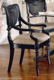 Pair Of Heritage Black Cane Dining Chairs With Upholstered Seats Arm Chairs Cane Dining Chairs Largo Furniture Dining Room Chairs