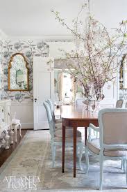 In The Dining Room A Colorful Oushak Rug Picks Up The Color Thread Of The Large Scale Wallpaper And P Dining Room Colors Dining Room Wallpaper Dining Room Rug