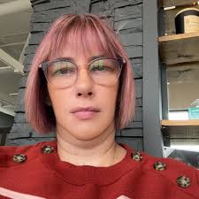 What is causing the thumping noise from the rear axle area of my 2024 Kia  Telluride while making slow turns?