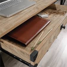 This computer desk is made of a thicker metal frame and sturdy wood board for good stability. Sauder Steel River Engineered Wood And Metal Computer Desk In Milled Mesquite 425907