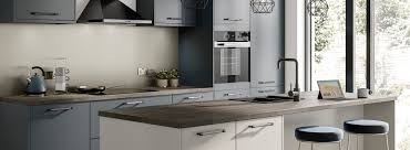 The doors feature a solid 105mm wide oak frame adorned with grooved joints. Formica Prima Worktops Formica Group