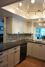 The Cabinetry In This Kitchen Is From Fine Wood Design Housetrends Wood Design