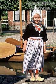 Clothing and textile dutch clothing traditional outfits tambour embroidery folklore fashion costumes around the world folk fashion culture clothing traditional dresses. A Dutch Girl With Traditional Costume The Strips Of The Dress Are Also The Color Of Dutch Flag Traditional Outfits Dutch Clothing Traditional Dresses