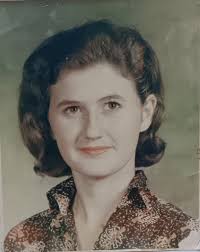 This is my mum at 17, she said the dress was lilac, can anyone help