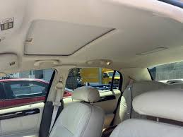 Image result for Medium Gold 1998 Town Car