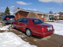 Image result for Toreador Red 1999 Town Car