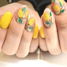 Lemon Nail Art Is Truly Thriving This Summer So Get On It These Lemons Are Set On Top Of Short Almond Shaped Nails With Bright Lemon Nails Nails Nail Designs