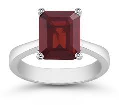 Crafted of 14k white gold, the ring has a total diamond weight of 1/10 carat. 8mmx 6mm Emerald Cut Garnet Solitaire Ring In 14k White Gold