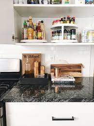 Attach a small basket to the side of a cabinet, in which you can put items such as cutting boards, spices, utensils, and more. The 59 Best Kitchen Cabinet Organization Ideas Of All Time Apartment Therapy