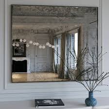 The mirrored border is richly veined. Color Mirror