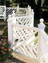 Chippendale balustrades are combined with square spindles here to keep the rail system from chippendale balustrades combine with a custom pergola and garage doors to create an exterior. 24 Chippendale Fence Ideas In 2021 Chippendale Porch Railing Railing Design