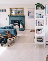 Great Living Room With Teal Painted Bricked Fireplace And Dusty Blue Teal Velvet Sofa Love The Living Room Carpet Trendy Living Rooms Living Room Decor Colors
