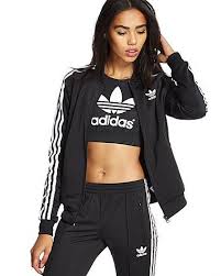Womens Black Adidas Crop Top This Women S Adidas Superstar Track Top Is A Reissue Of One Of Adidas Most Iconic Styles The Regular Fit Adidas Tracksuit Adidas Outfit Women Adidas Jumpsuit