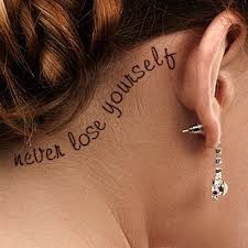 The blue eye is truly unusual. Woman With Quote Tattoo Behind The Ear Behind Ear Tattoos Behind Ear Tattoo Ear Tattoo