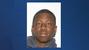 Man wanted for murder charges after attempted armed robbery in Suffolk