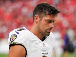 Man waits outside for away football game