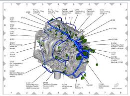 The oil temperature sensor is located on the oil filter/cooler housing under the intake manifold. Coolant Temperature Sensor Location Coolant Temperature Sensor