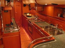 Since its inception ik yacht design has branched out into the residential, commercial, luxury recreational vehicle and aviation industries. I Love The Corian Countertops Especially The Pin Striping Sailboat Interior Yacht Interior Design Boat Galley
