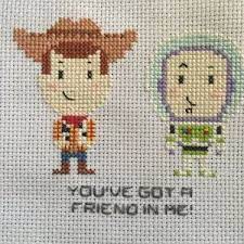 When adding a cross stitched design to a two sided item like burp cloths and blankets, it works best if the pattern is stitched on a separate larger piece of fabric, and then appliqued in place and edged out in ribbon or. Toy Story Inspired Cross Stitch Pattern Pdf Instant Download Woody Buzz Disney Cross Stitch Disney Cross Stitch Cross Stitch Stitch Toy