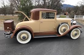 Image result for Martini Brown 1931 Oldsmobile