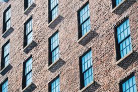 Combining the strength and elegance of steel with sleek. Building Architecture City Windows Industrial Reflection Brick Glass Steel Construction Pattern Lines By Kelsey Fowler Photo Stock Snapwire