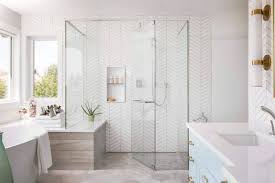 With a center entry point, transparent glass walls on both sides maximize the design impact of the graphic tiled wall. 44 Modern Shower Tile Ideas And Designs 2021 Edition