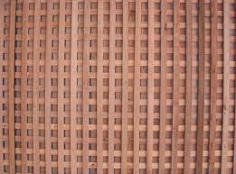 The design is created by crossing the strips to form a network. Garden Accents Lattice Panels Picnic Tables Railroad Ties Garden Furniture