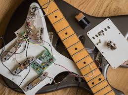 Eric's guitar collection features some of the most iconic instruments in the history of rock and roll. Diy Workshop Rebuilding Chris Buck S Eric Clapton Strat Guitar Com All Things Guitar