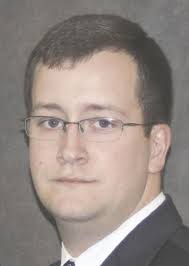 Eyeing exit, sheriff re-shuffles top staff