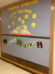 Reading Readinggivesyoumanyfeelings Emojis Thenewhandhelddevice Books Elementary Elementary Library Elementary School Library Library Bulletin Boards