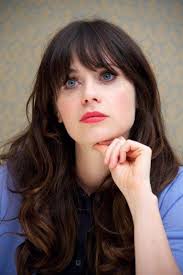 The actress, 31, rocks the same tousled hairstyle as her character, jess day: Picture Of Zooey Deschanel S Iconic Fringe