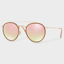 Remise effectuée en caisse sur les montures et lunettes de soleil signalées en magasin. Lunettes De Soleil Rondes Avec Etui Acheter En Ligne Manor