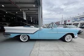 Image result for Artesian Blue 1957 Oldsmobile