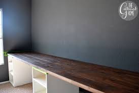 How To Make A Diy Plank Top Ikea Cabinet Desk Ikea Diy Ikea Desk Hack Ikea Furniture Hacks