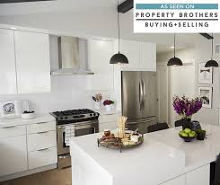 Modern cabinets in high gloss white lacquer reflect light and make the room feel larger and brighter. White High Gloss Kitchen Cabinets Diamond