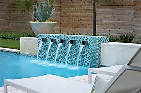 For many people, water features like this provide the perfect finishing touch to a new pool. 10 Trendy Swimming Pool Water Feature Ideas Ferrari Pools