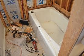 There's no room to build a tile deck around the tub. An Overview Of An Acrylic Tub Installation Extreme How To