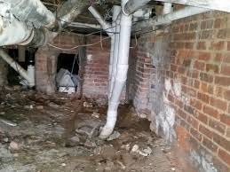 Broken asbestos tile in basement. Asbestos Abatement Neo Corporation