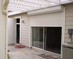 Shutters are so perfectly suited for sliding doors. Sliding Glass Door Shutters Southern California Rolling Shutters 800 818 7006