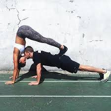 The Most Insane Couples Yoga Poses You Ve Ever Seen Pucker Up Imagine How Much More Toned Your Abs Would Couples Yoga Couples Yoga Poses Partner Yoga Poses