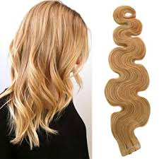 Where girls with curls should buy extensions. Amazon Com 20 Long Strawberry Blonde Curly Tape In Hair Extensions 50grams 20pcs Skin Weft Body Wave Tape In Extensions Remy Human Hair Beauty