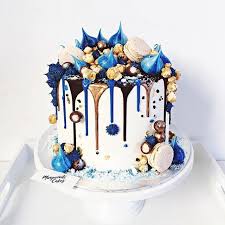 Black And Gold Drip Cake With Flowers Navy Black And Gold Drip Cake Drip Cakes Blue Birthday Cakes Birthday Drip Cake