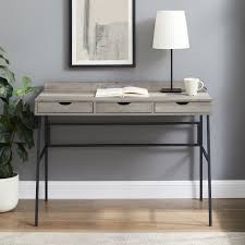 This writing desk is a great addition to any office, home office or dorm room, and makes a perfect gift for anyone who loves to show their love for their favorite nfl team or team spirit! Walker Edison Furniture Co Marvin Gray And Black Angled Front Desk With Three Drawer D42mar3dgw Bellacor